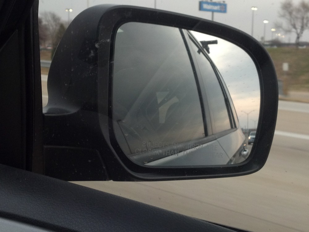 4 pm. Driving back from the airport through grey skies and desolate sprawl. its hard to find a picture.