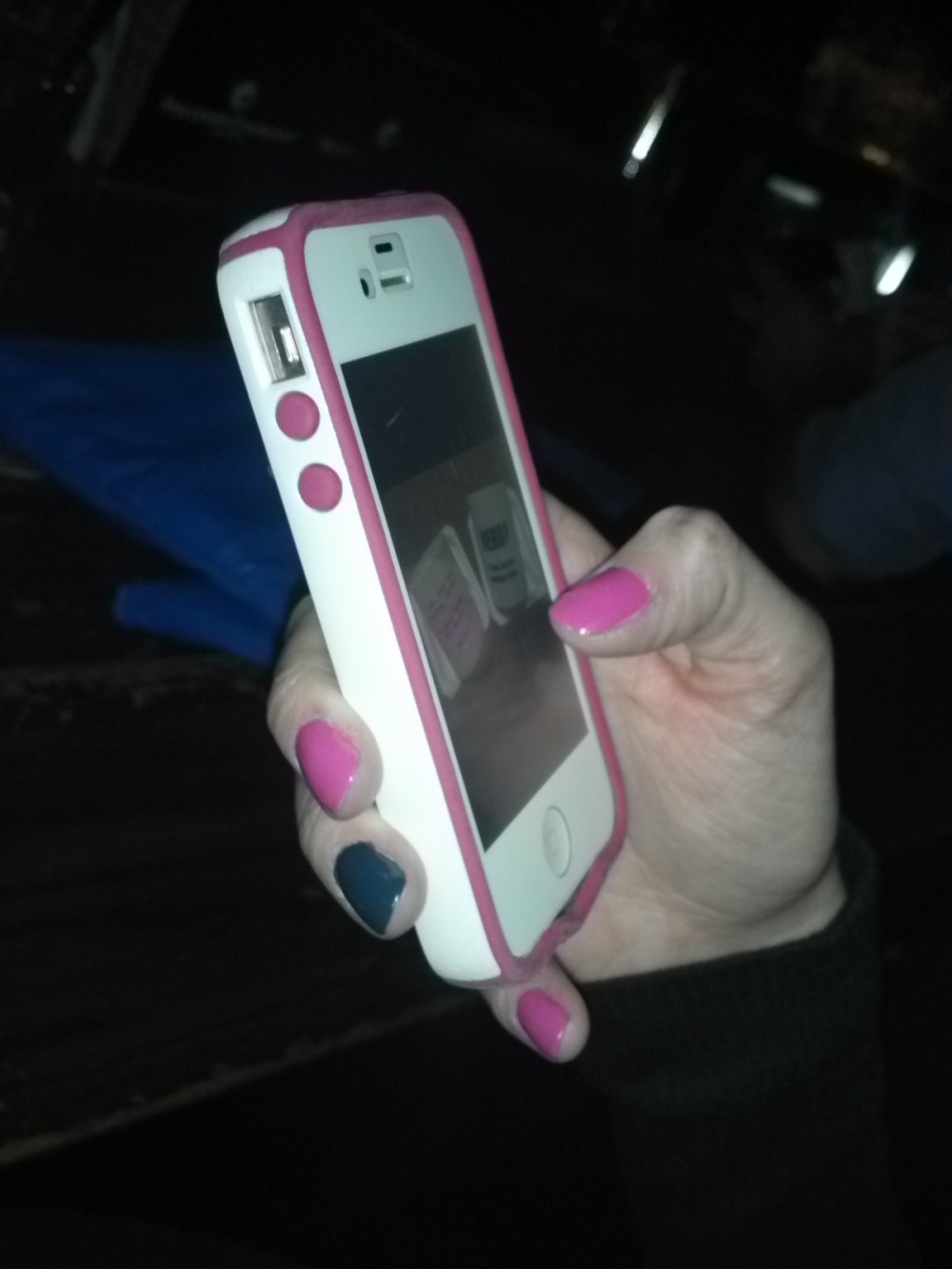 1 am. Tiffany checks her phone at 15th Street Vickery Park.