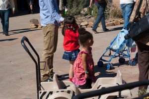 More kid glasses, and a little top bun.