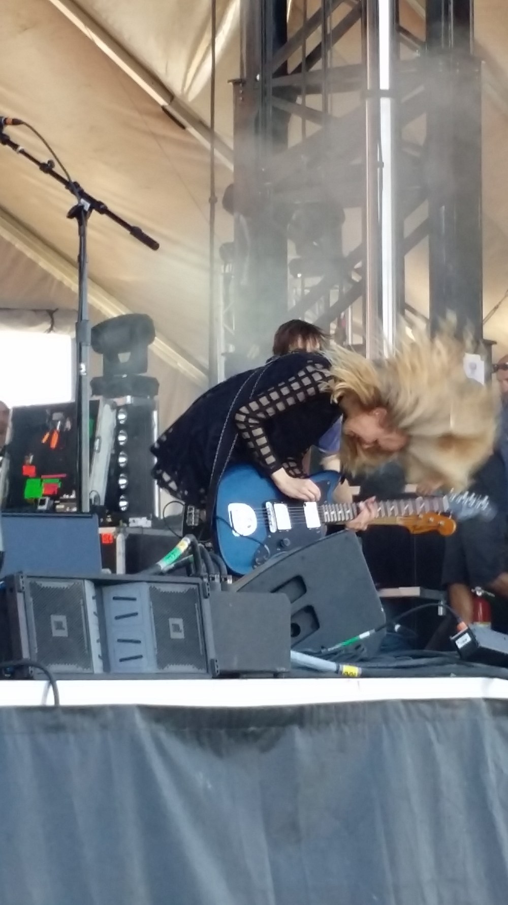 Ume swings hair, shows off guitar collection.