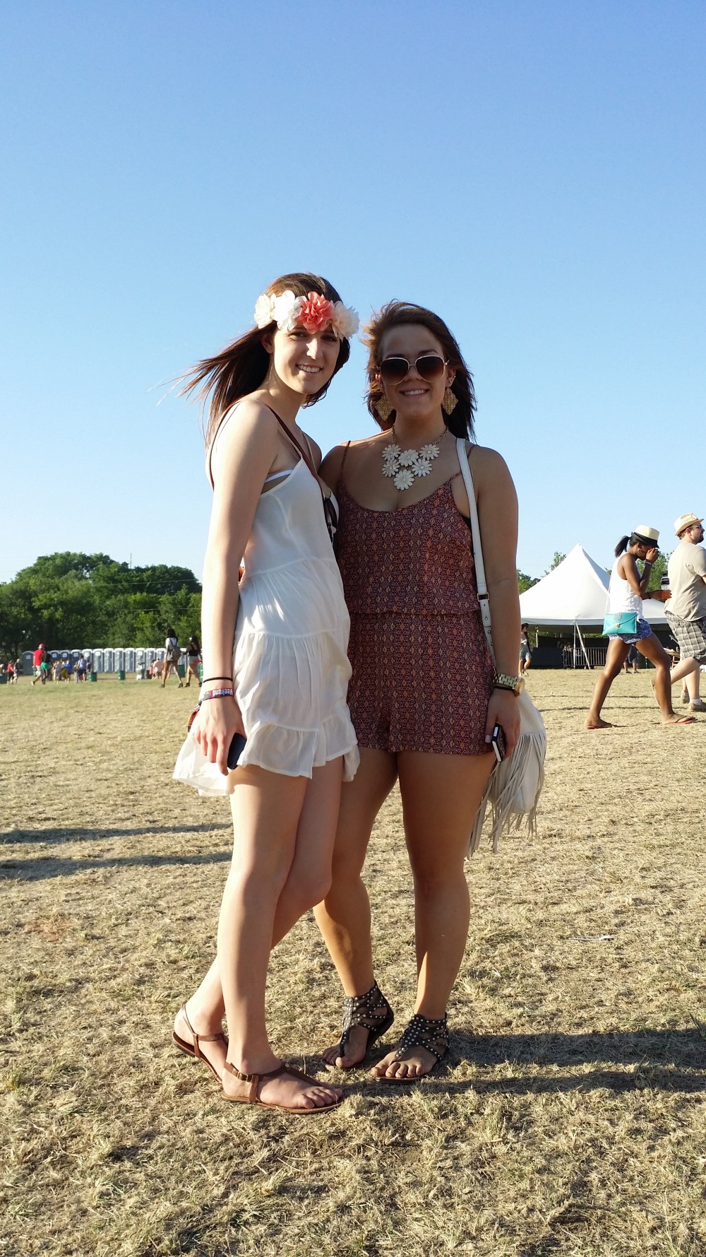 White sundress and flower crown; romper and statement necklace.